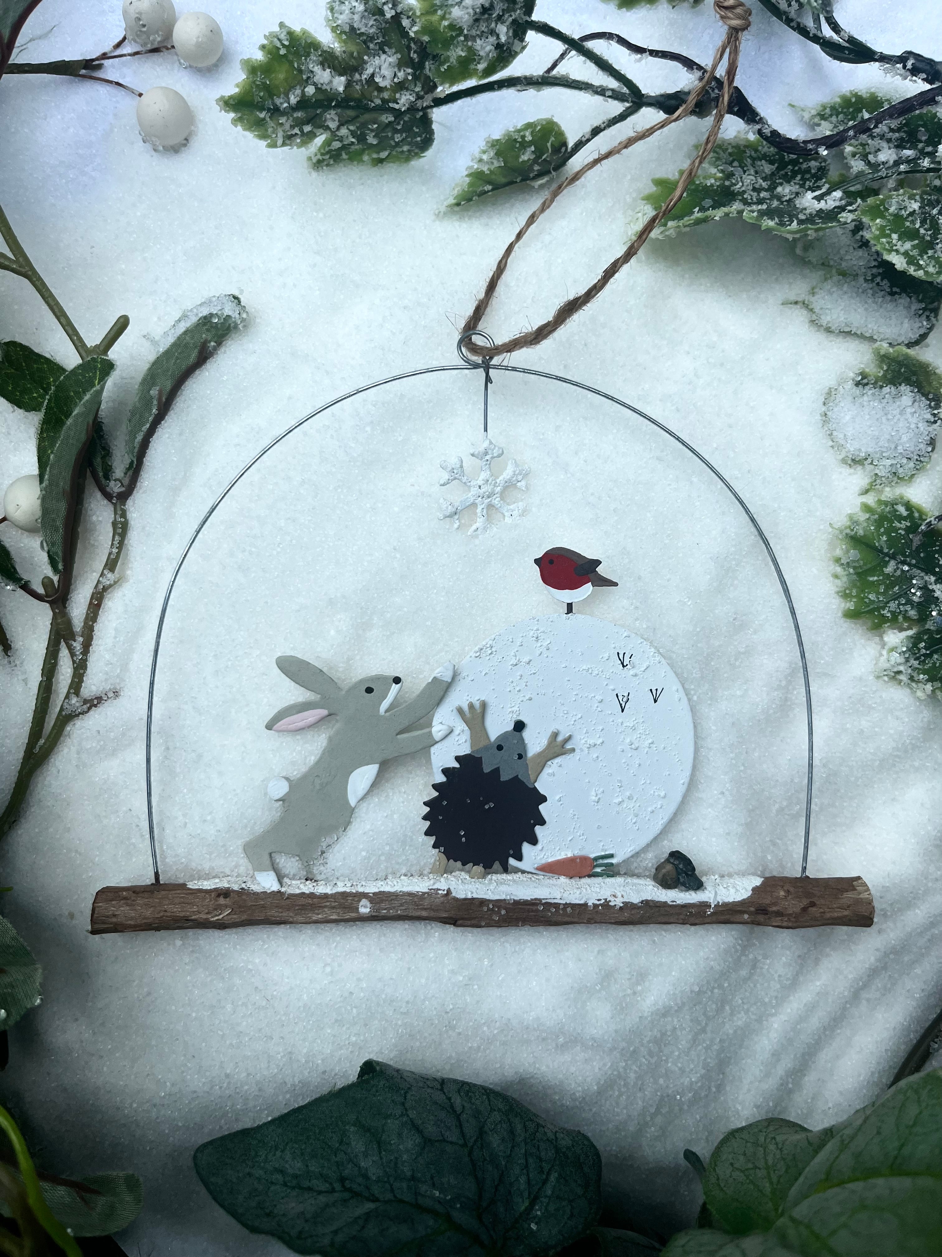 Robin, Rabbit and Hedgehog Pushing Snowball